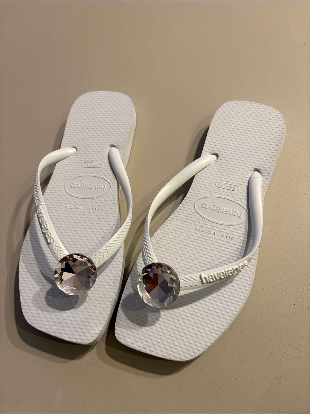 Havaianas White Flip Sandals with Faceted Crystal Accent